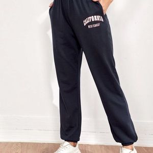Letter Graphic Slant Pocket Sweatpants